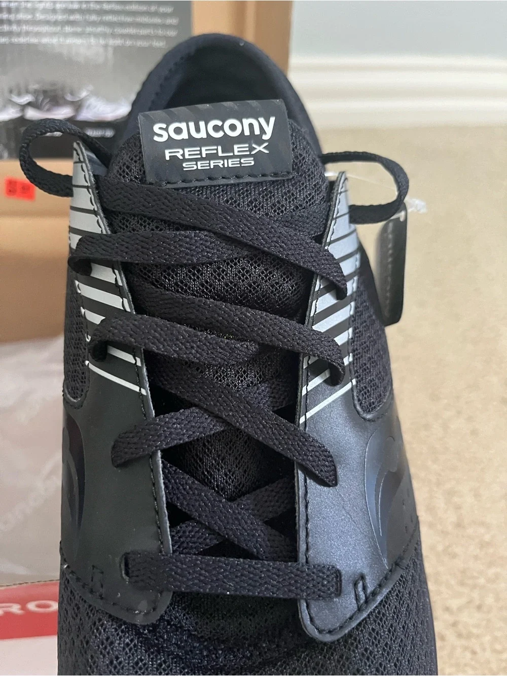 Saucony Men’s Black Athletic Shoes with White Speckled Soles